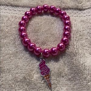 A pink ice cream charm bracelet